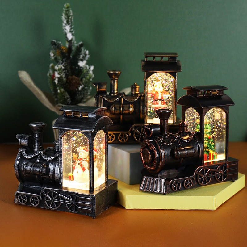 Decoratiune de Craciun tip Locomotiva, Flippy, Glob de Cristal cu Fulgi de Zapada, Model Om de Zapada, Iluminare LED, 11.5 x 12.5 x 6 cm, Carcasa Vintage Bronze, Transparent - imagine 3